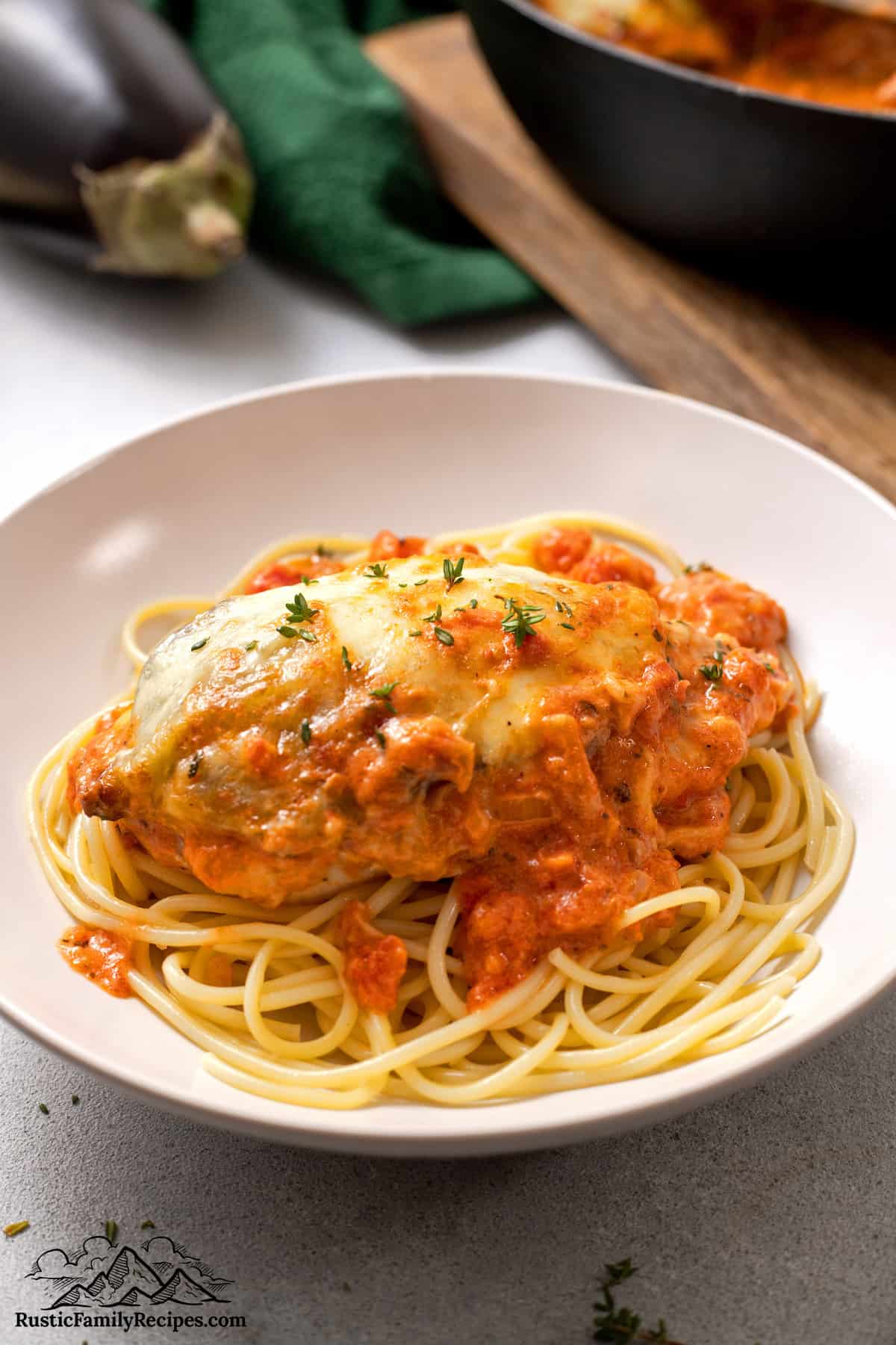 Chicken Sorrentino is served on a bed of spaghetti
