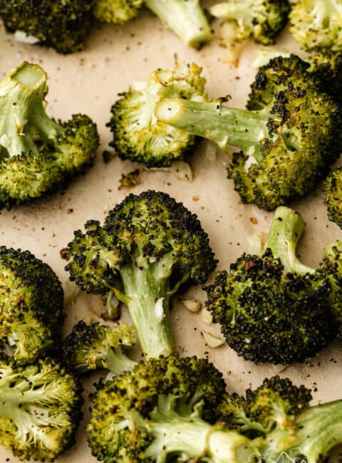 Roasted broccoli on parchment paper