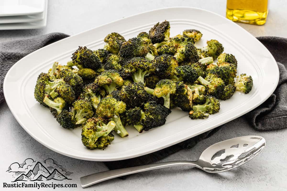 Roasted broccoli on a white plate