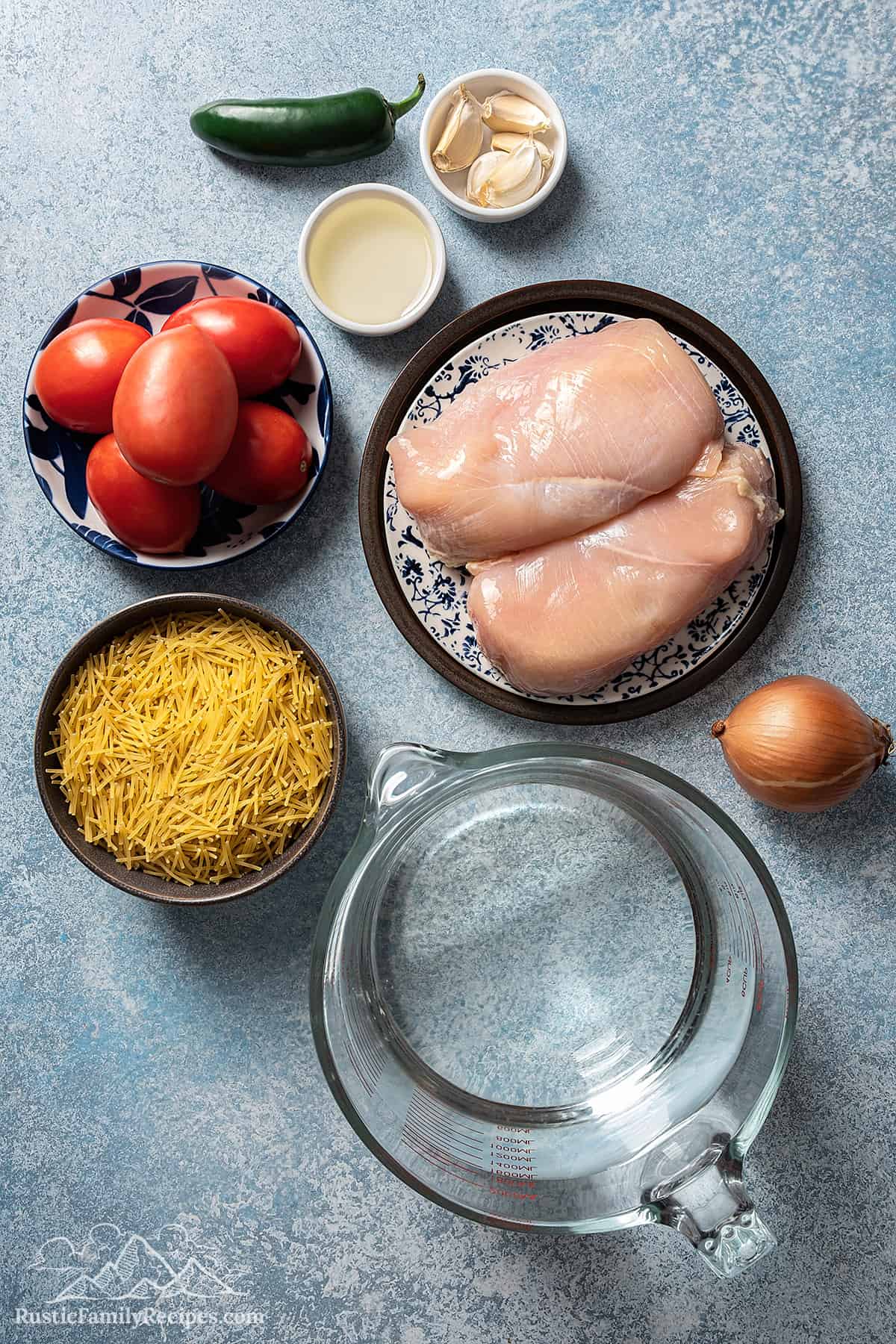 Ingredients for Sopa de Fideo on a counter