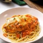 Chicken Sorrentino is served on a bed of spaghetti
