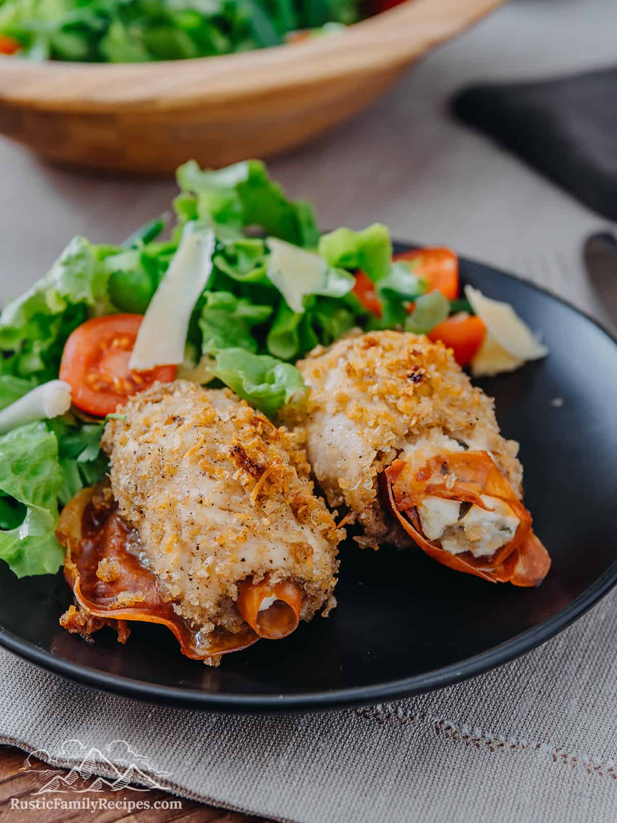 Cooked Chicken Rollatini served with salad