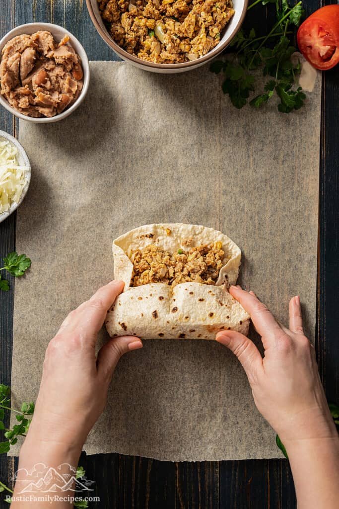 Rolling the burrito.