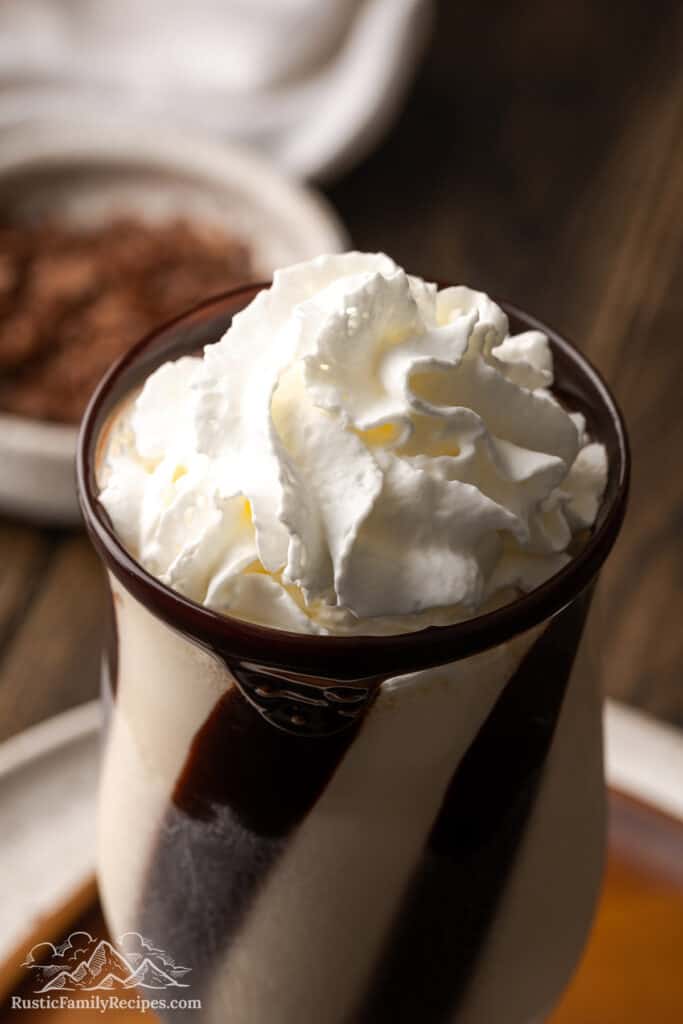 Whipped cream on top of a mudslide drink
