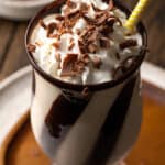 A mudslide drink with chocolate shavings on top