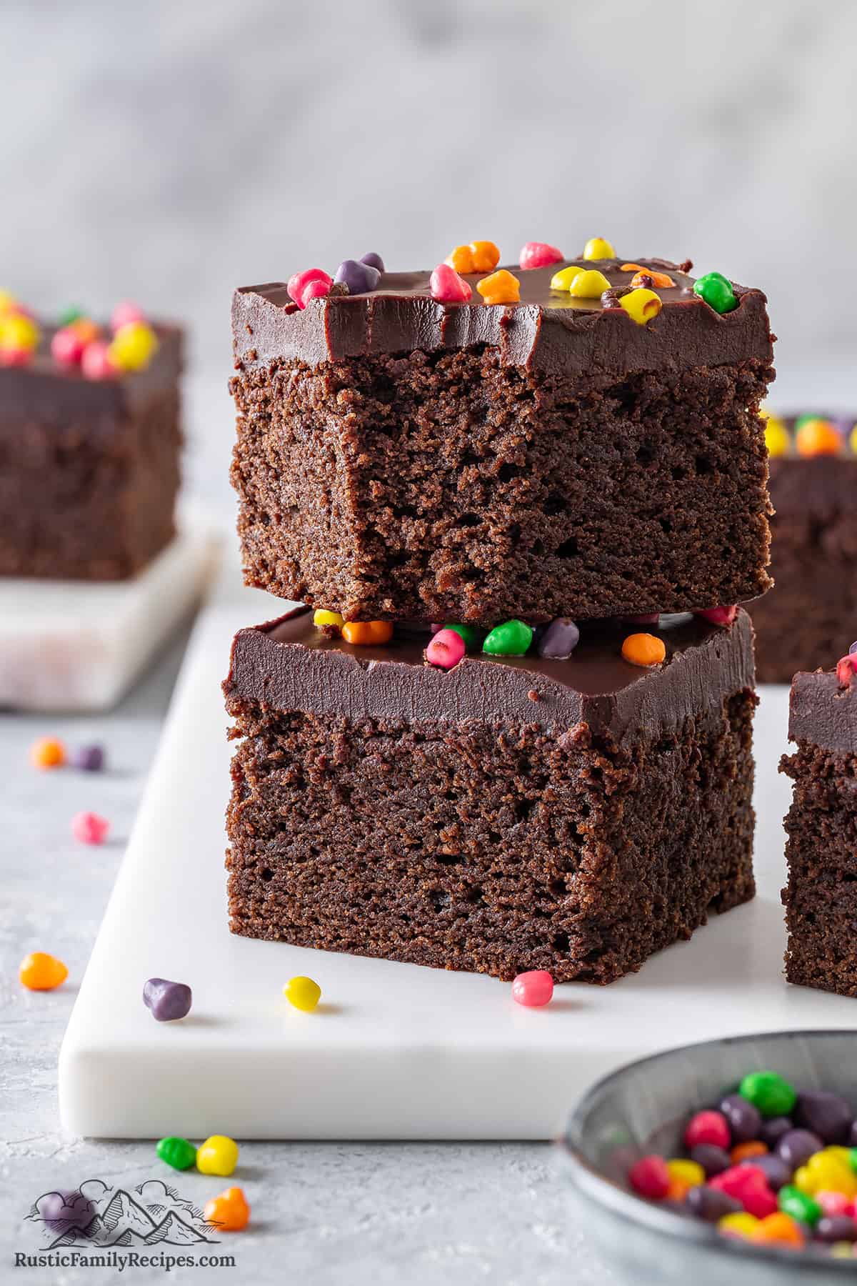 Two Cosmic Brownies stacked with a bite taken out of one