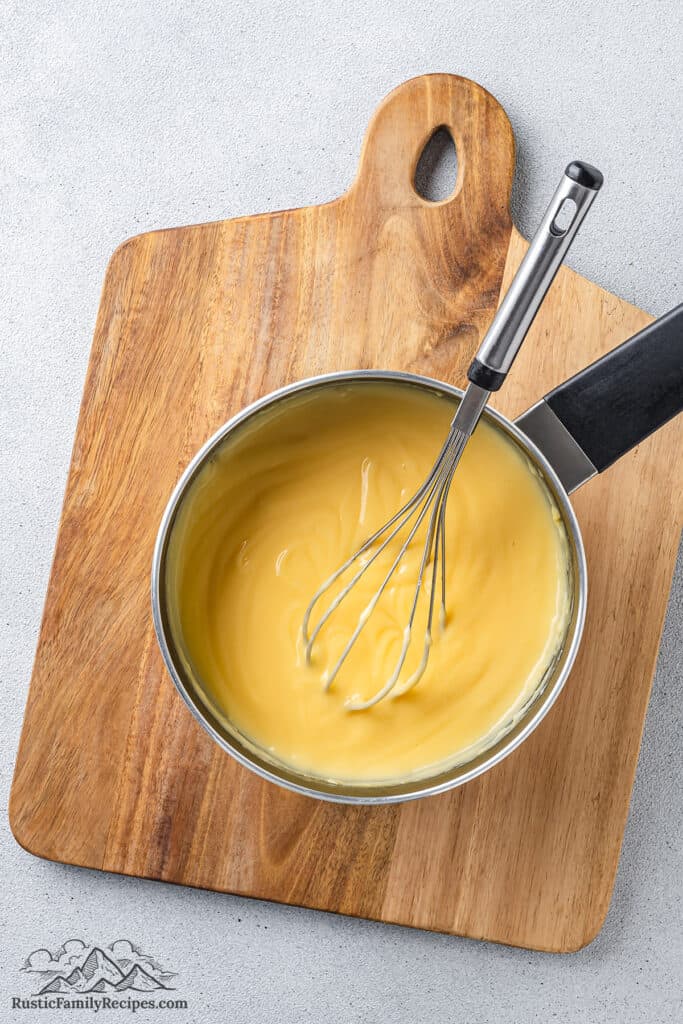 Mixing pastry cream in a saucepan