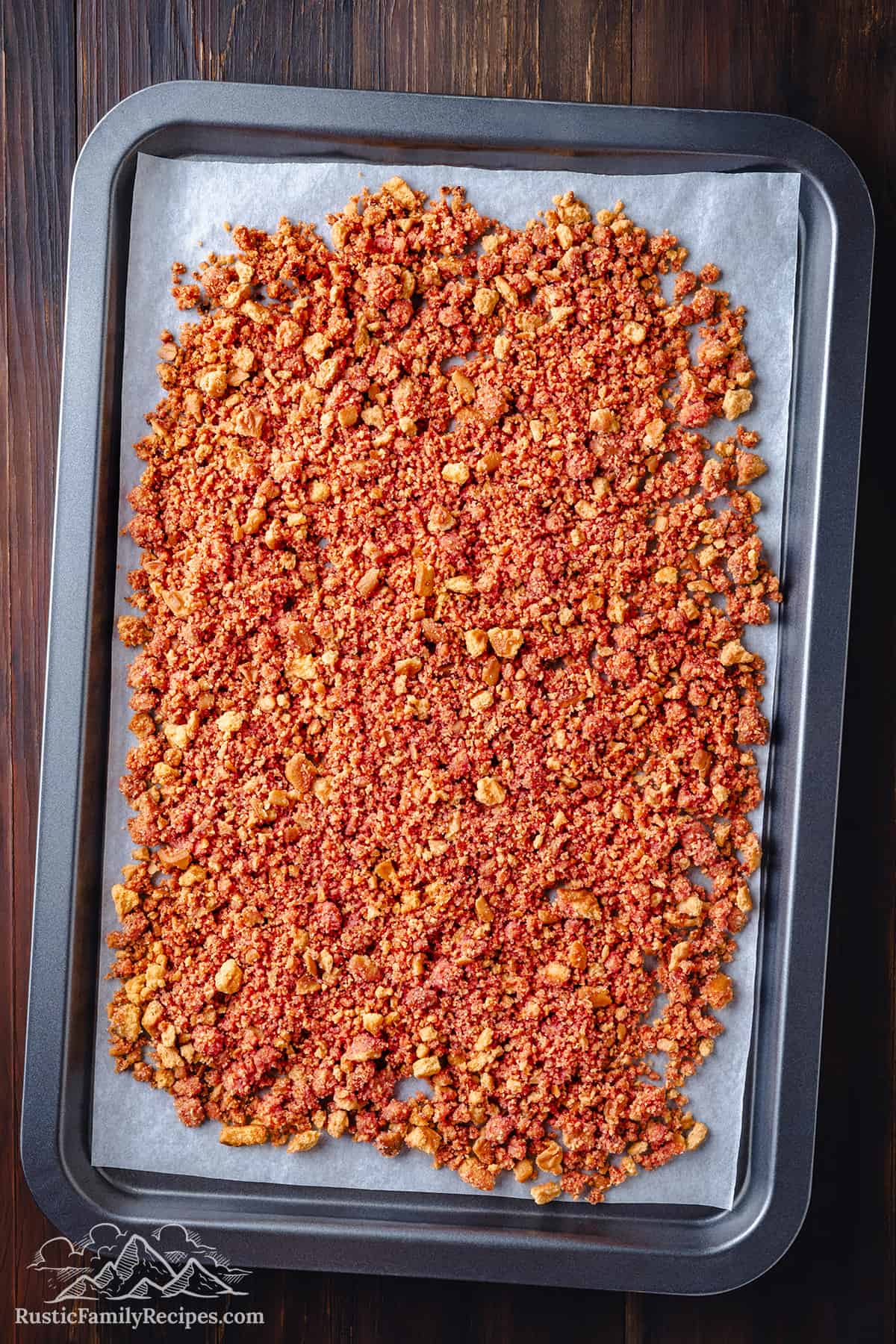Strawberry crunch topping on a baking sheet