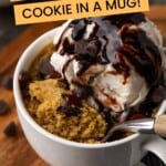 Chocolate chip cookie in a mug with ice cream and chocolate syrup