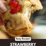 Hand holding a strawberry cheesecake cookie, Pinterest pin image