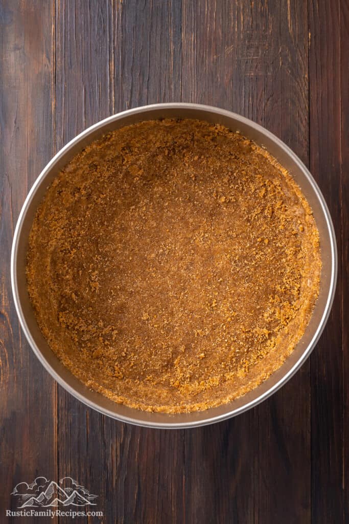 Making the graham cracker crust for cheesecake