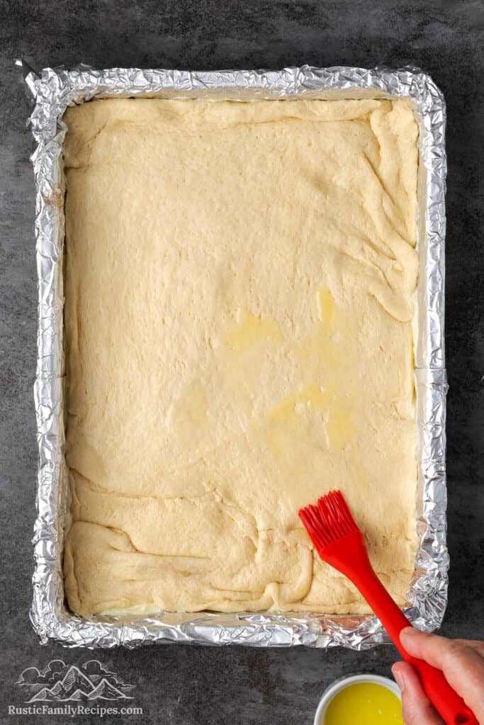 Adding butter to the dough
