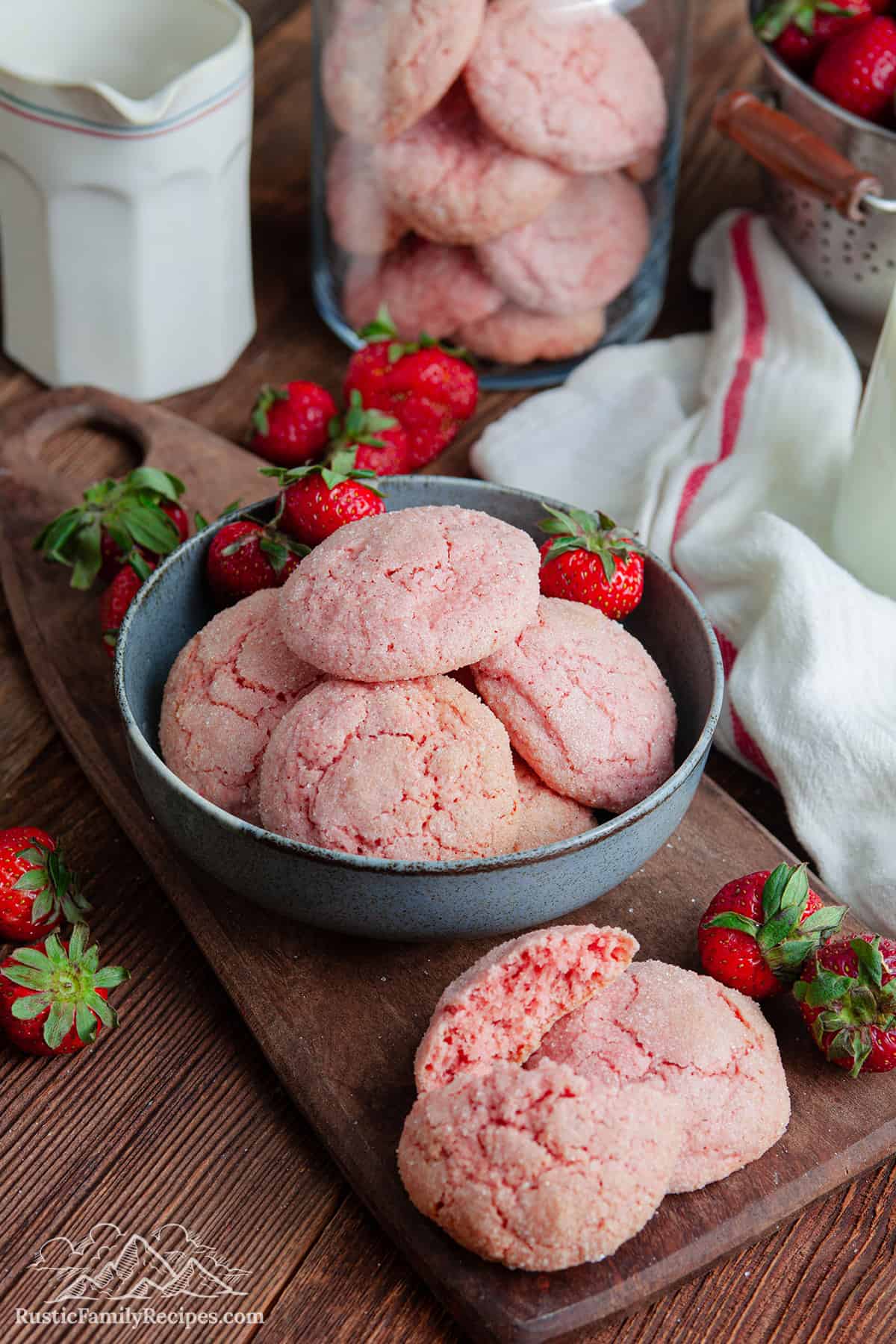 Strawberry cookies in a bowl and on a cutting board