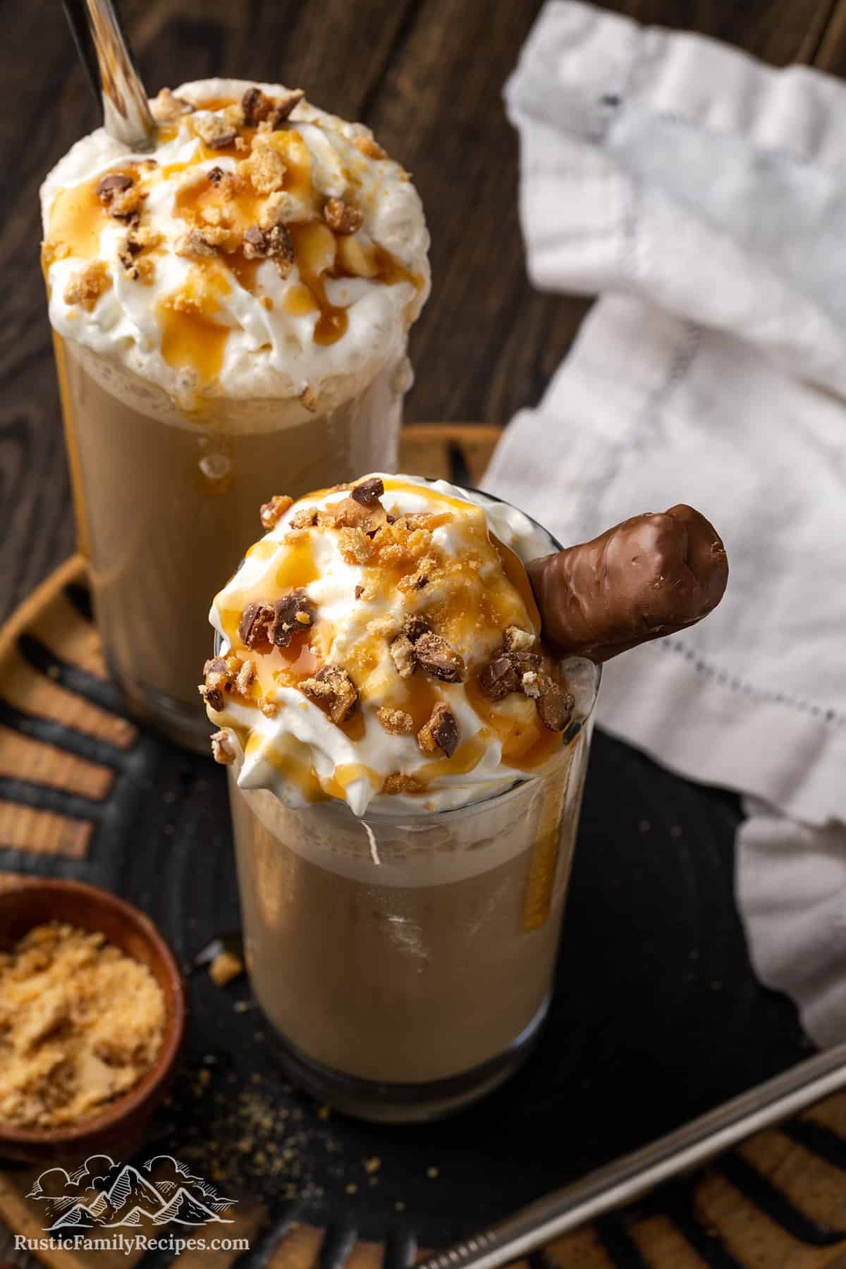 Top view of two caramel crunch frappucinos