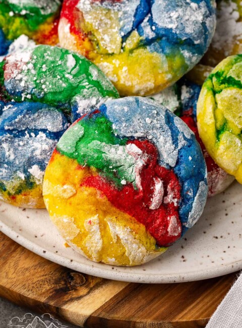 Close up of rainbow cool whip cookies on a plate
